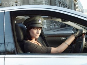Female Chauffeur in Car